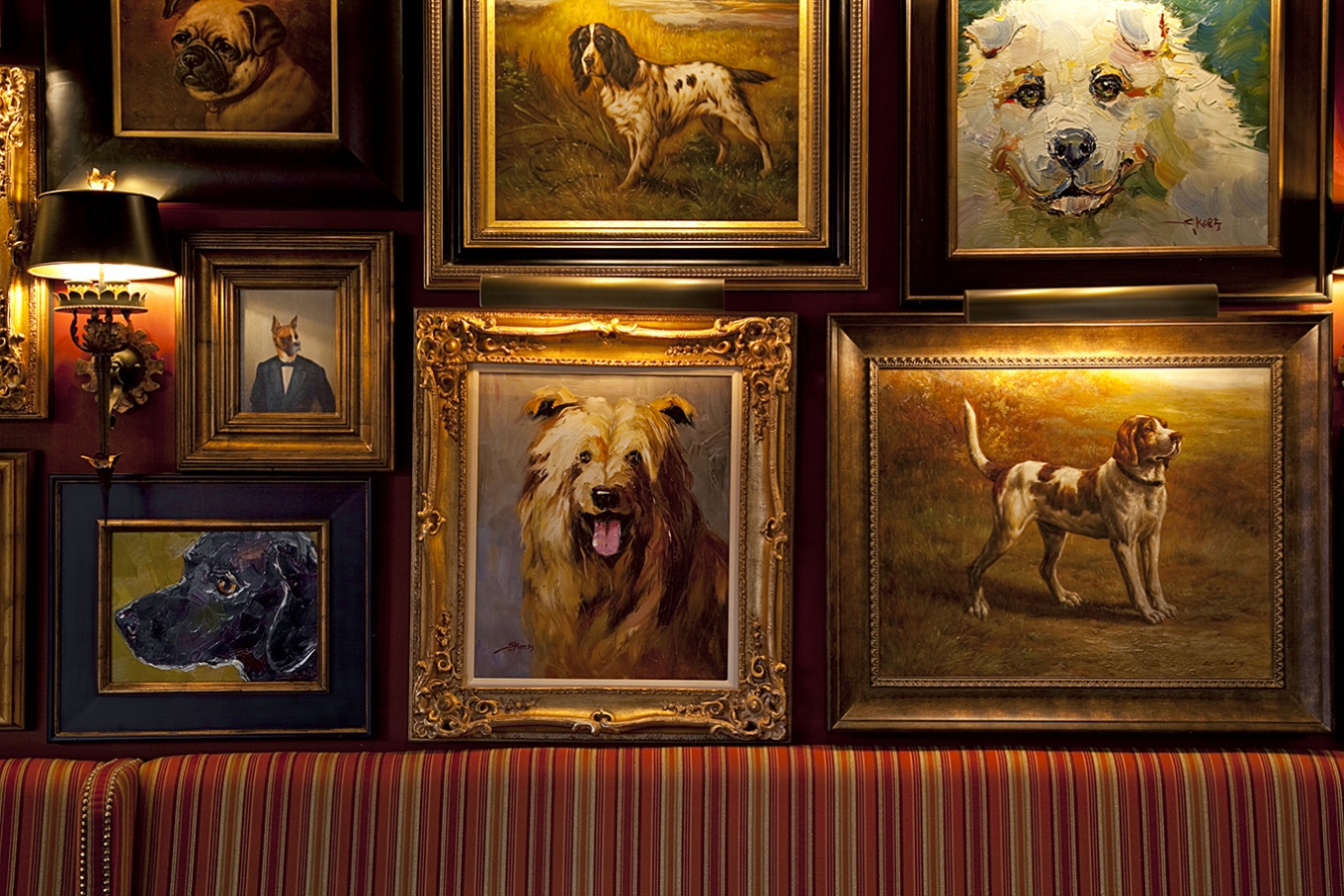 Dog portraits align the walls of White Dog Wayne